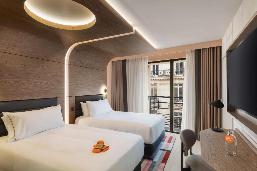 โรงแรม คาโนปี้ บาย ฮิลตัน ปารีส ทร็อกกาเดโร ปารีส
(Canopy by Hilton Paris Trocadero)